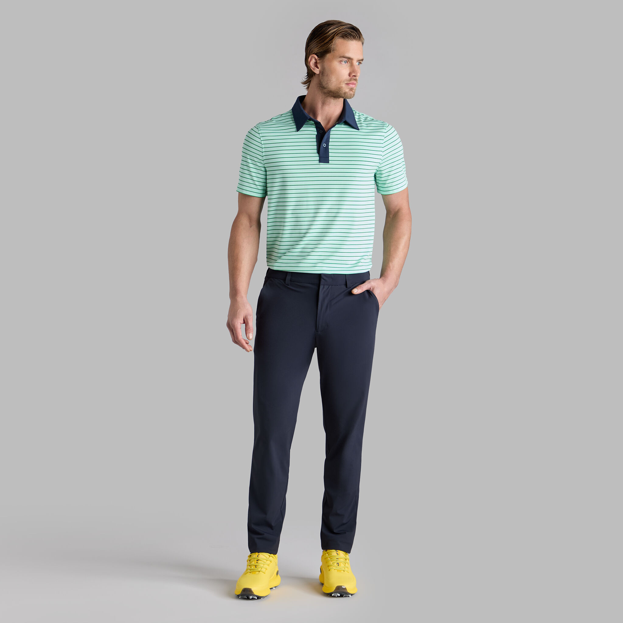 FEEDER STRIPE TECH JERSEY POLO