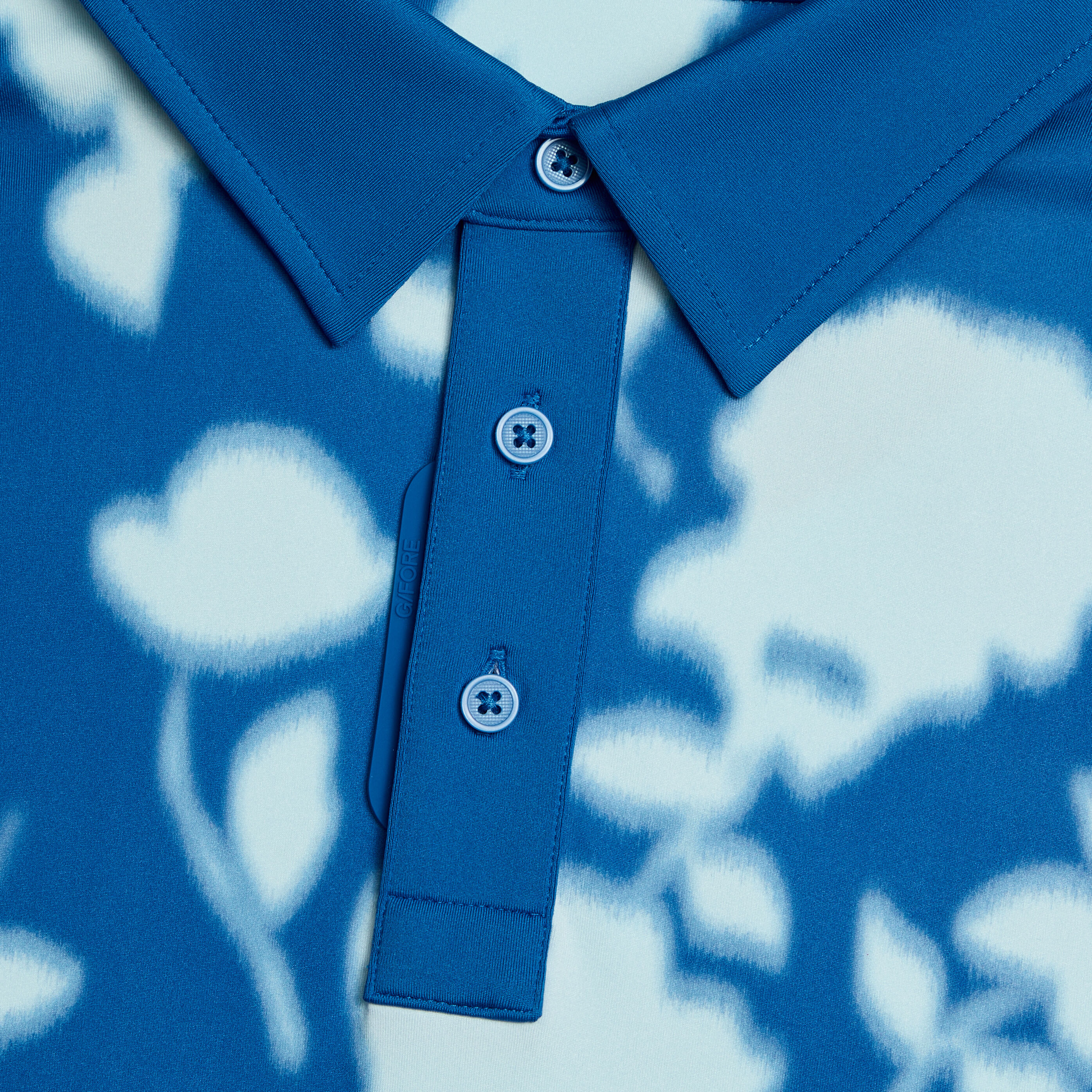 BLUR FLORAL TECH JERSEY POLO
