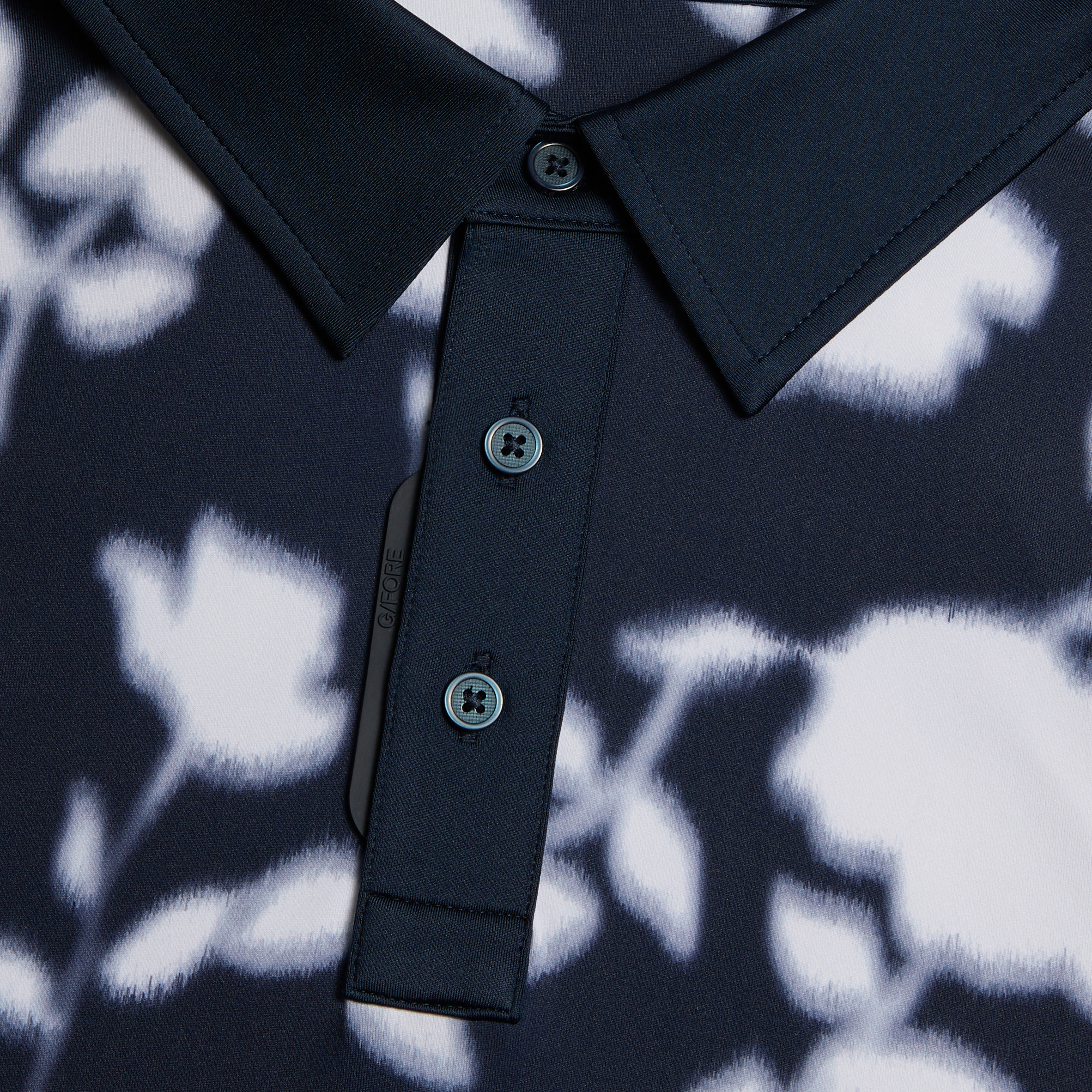 BLUR FLORAL TECH JERSEY POLO