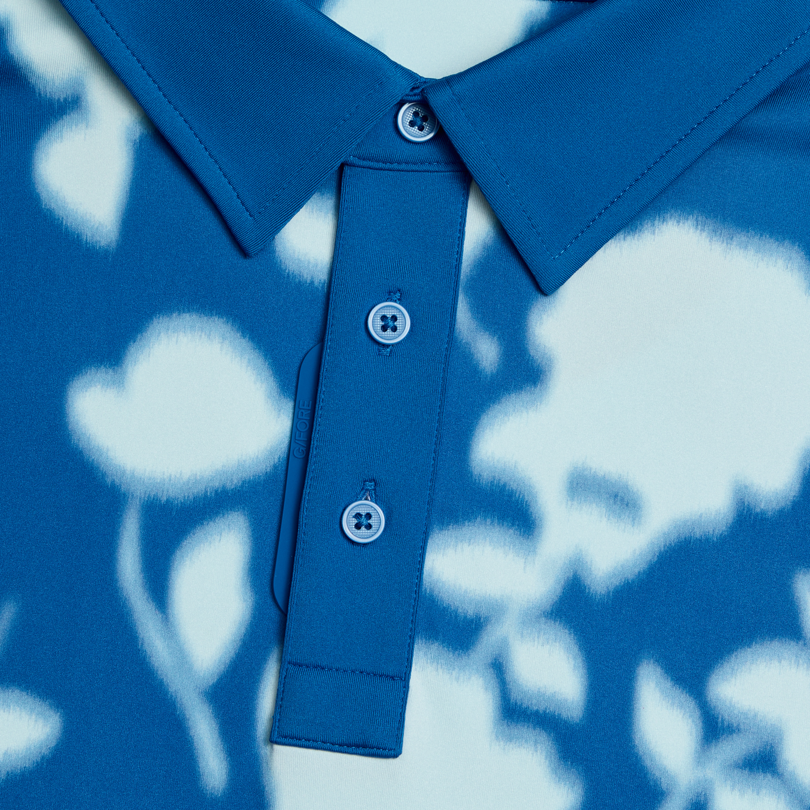 BLUR FLORAL TECH JERSEY POLO